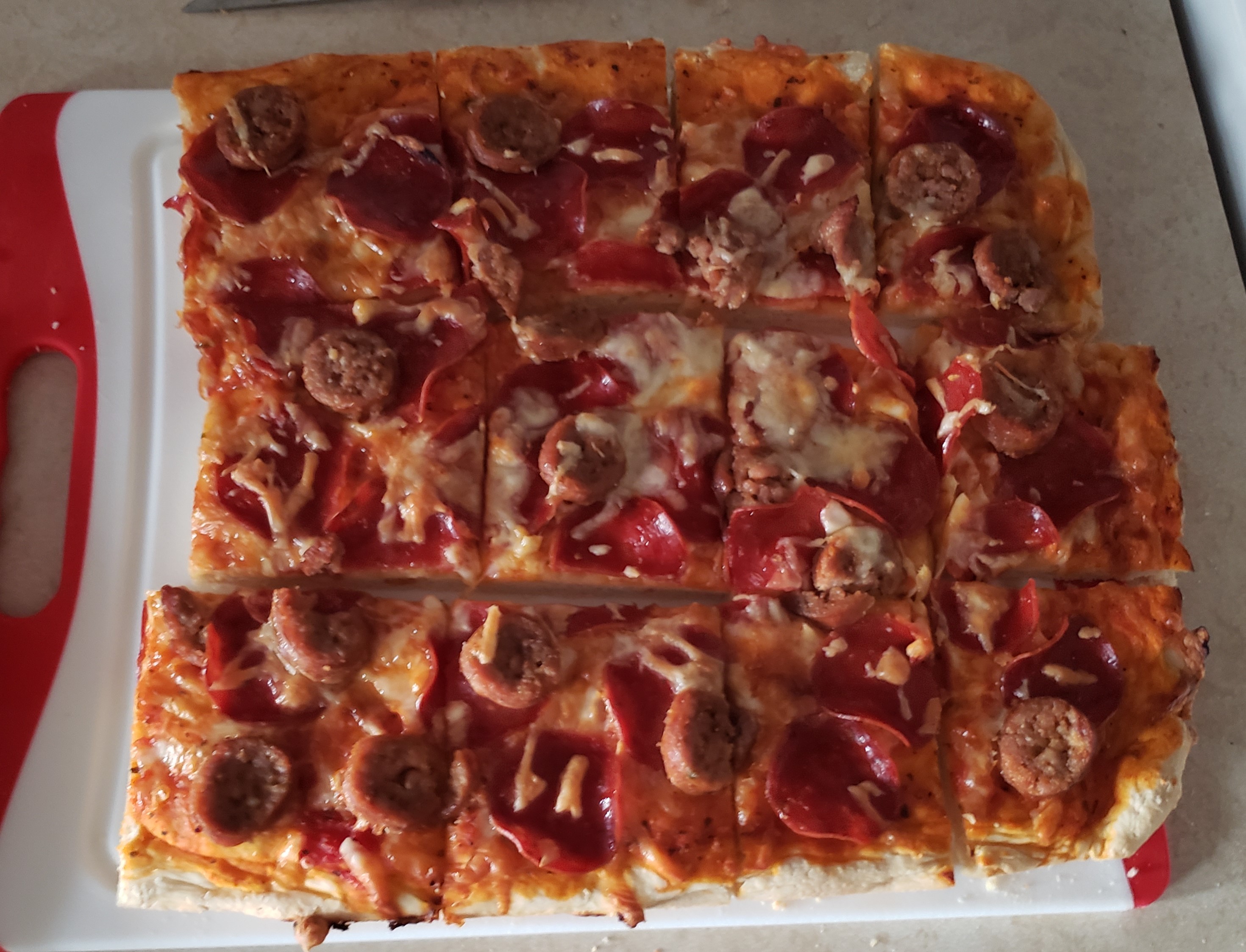 Homemade Pizza with Pepperoni and Sausage